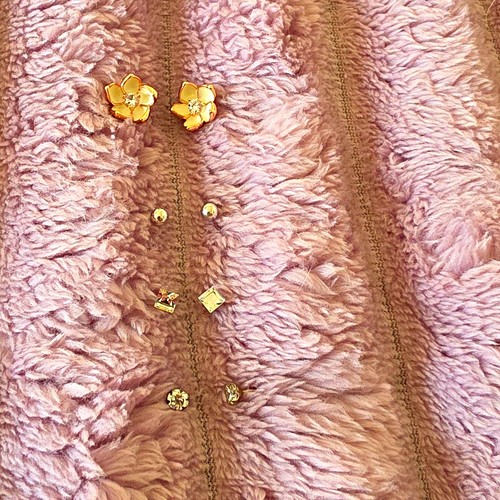 Gold tone metal flower stud - tone,